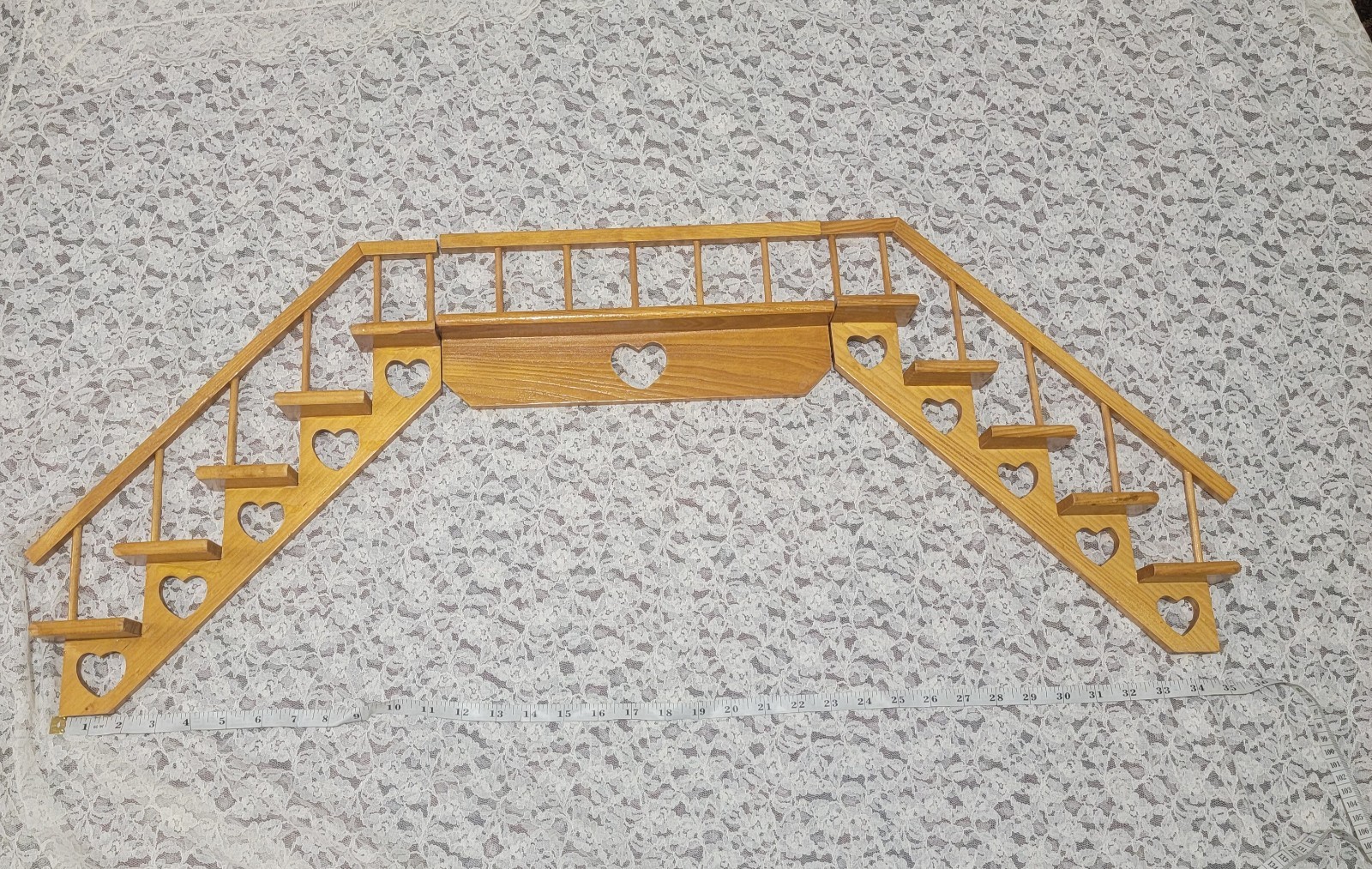 Vintage Wooden Staircase Wall Trinket Shelf Cottagecore heart cutout design. Vintage Wooden Staircase Wall Trinket Shelf Cottagecore heart cutout design.