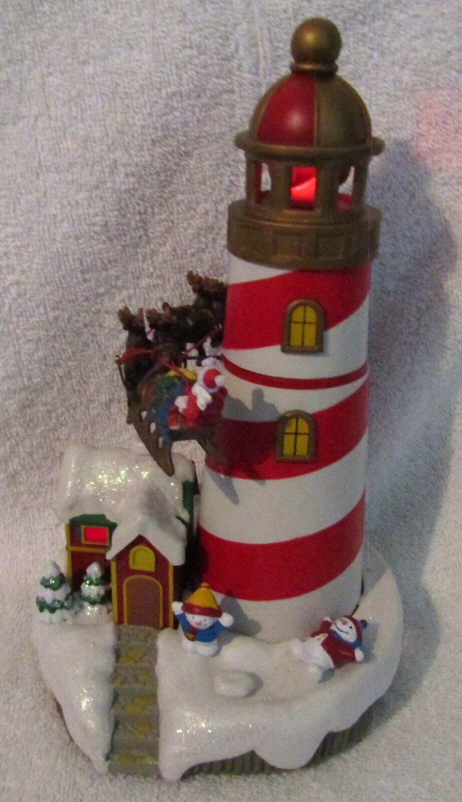 Vintage Battery Operated Electronic Santa's Musical Lighthouse.