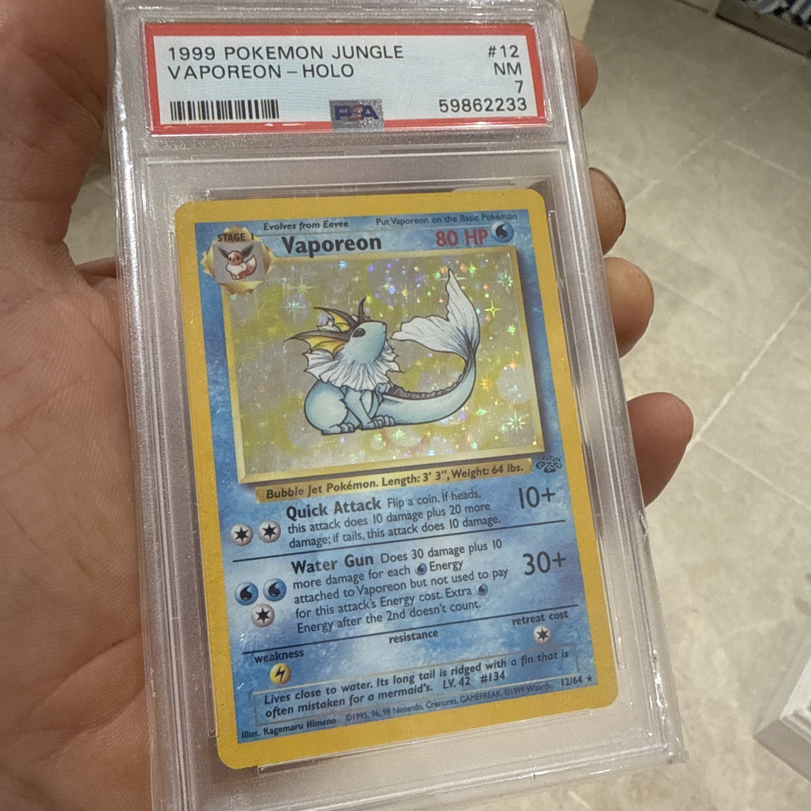 1999 Pokemon Jungle Holo No Symbol Vaporeon #12 PSA 7