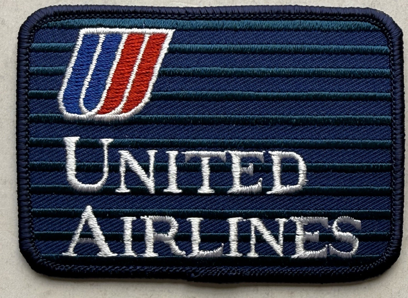 United Airlines - Uniform Clothing Patch - Tulip Logo - New / Unused United Airlines - Uniform Clothing Patch - Tulip Logo - New / Unused
