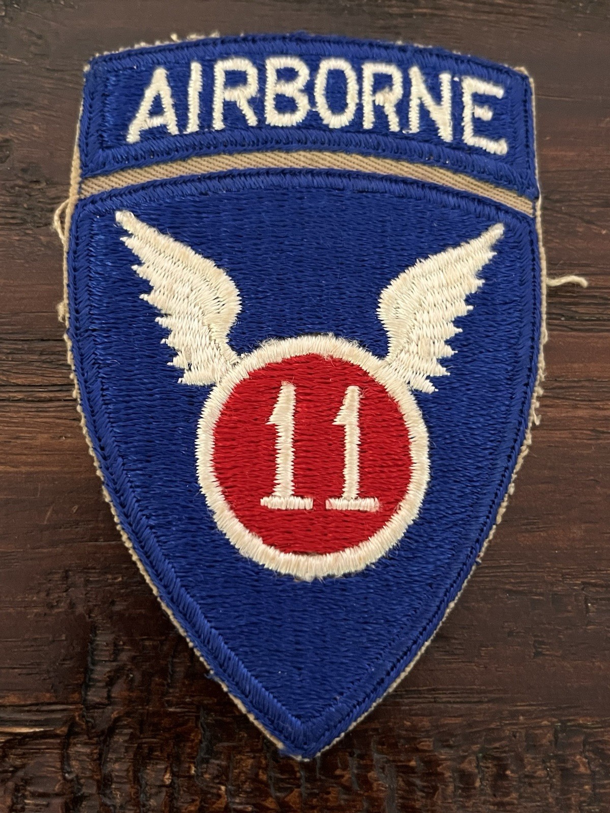 ORIGINAL PERIOD WWII WW2 US ARMY 11TH AIRBORNE PATCH W/ATTACHED TAB FE CE ORIGINAL PERIOD WWII WW2 US ARMY 11TH AIRBORNE PATCH W/ATTACHED TAB FE CE