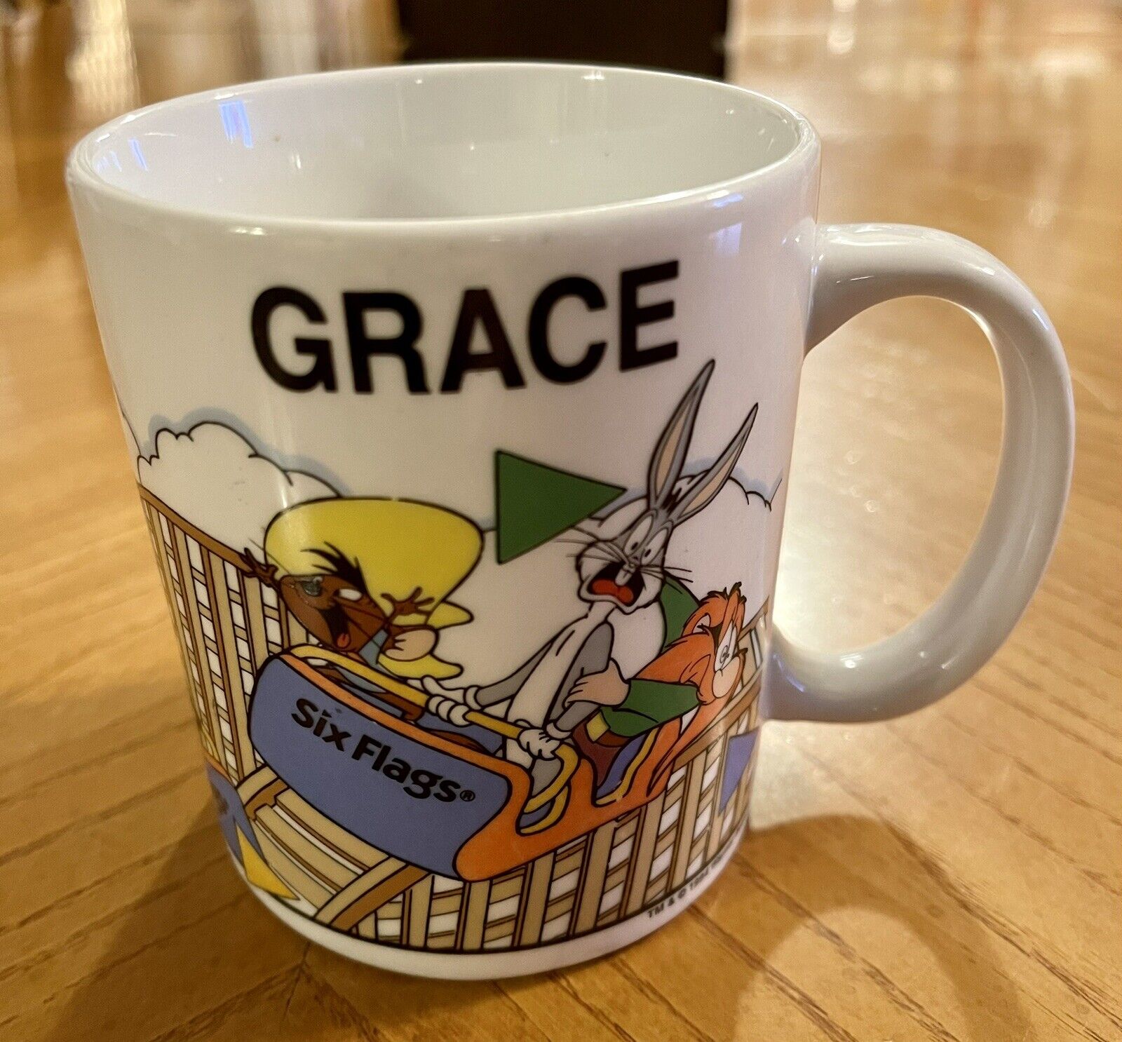 Six Flags “GRACE” Looney Tunes Souvenir Mug Cup By Linyi Warner Bros. 10 Oz