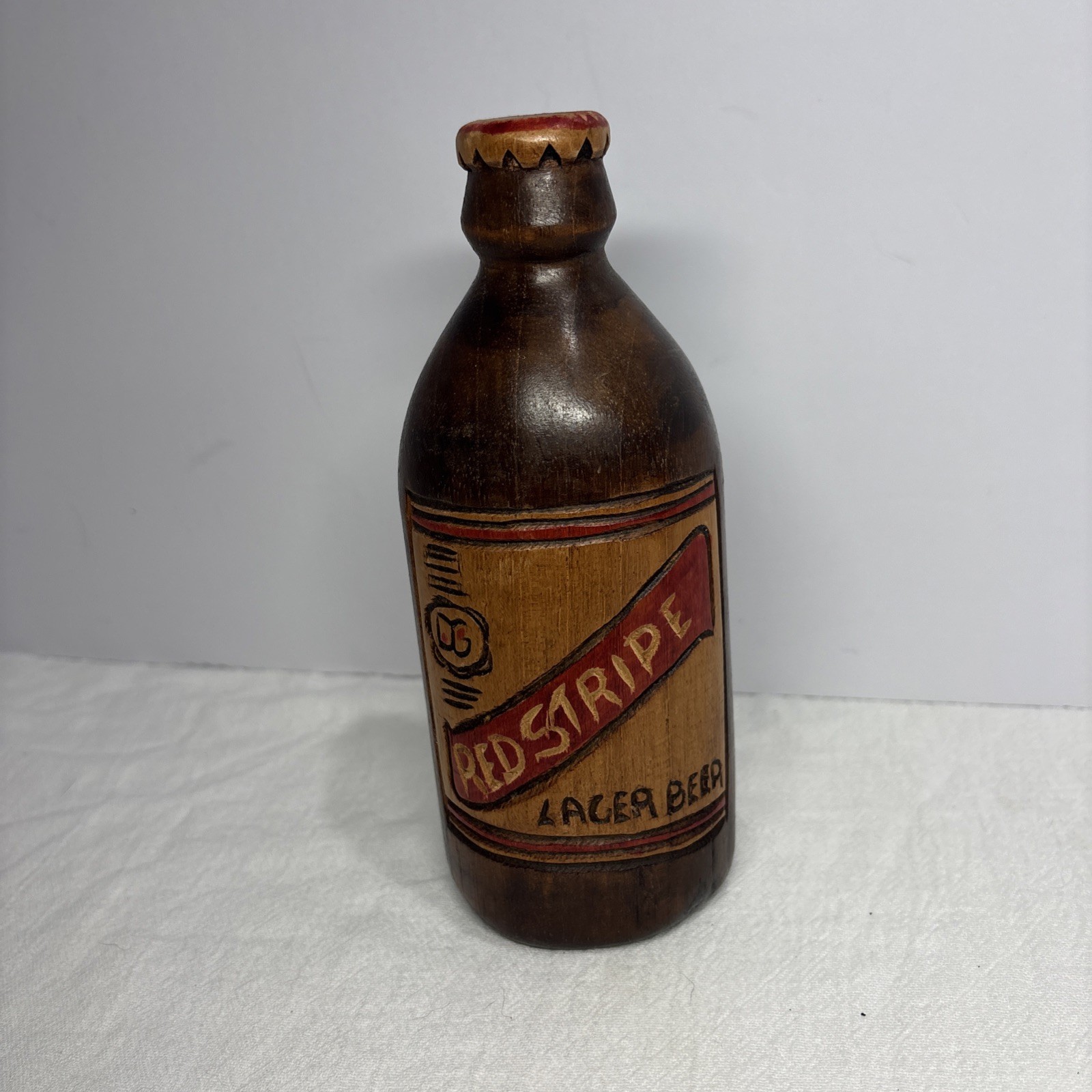 VINTAGE HAND CARVED WOODEN RED STRIPE BEER BOTTLE, BREWERIANA, BARWARE DECOR