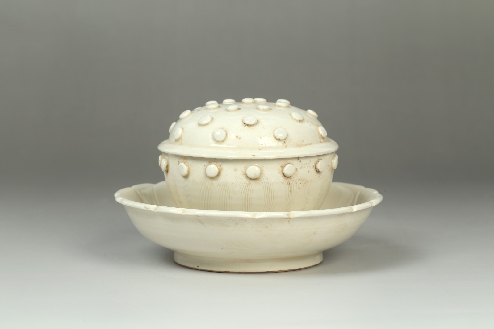 A Dingyao Cup with Saucer A Dingyao Cup with Saucer