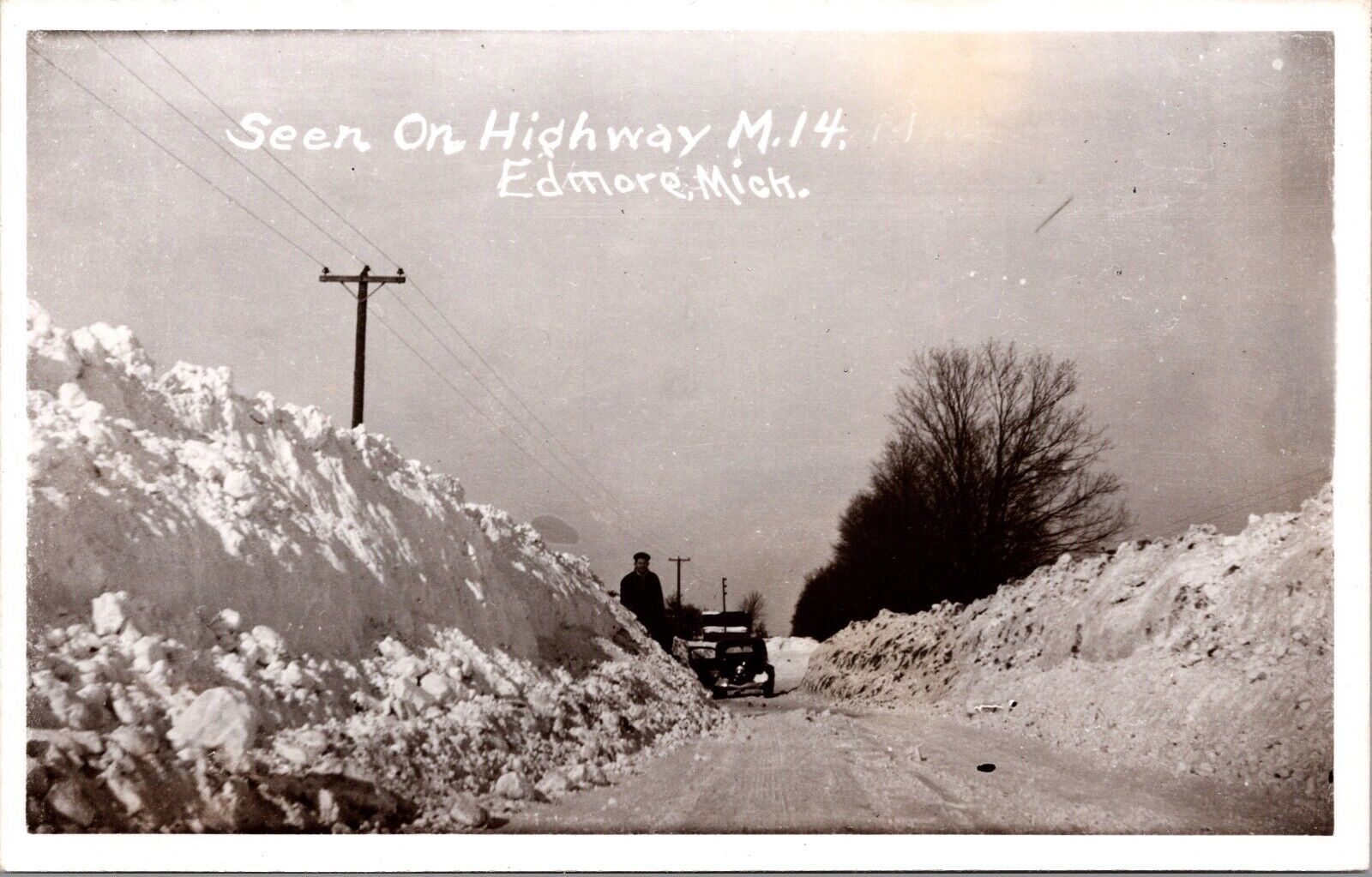 Real Photo Postcard Snowy Scene on Highway M. 14 in Edmore, Michigan