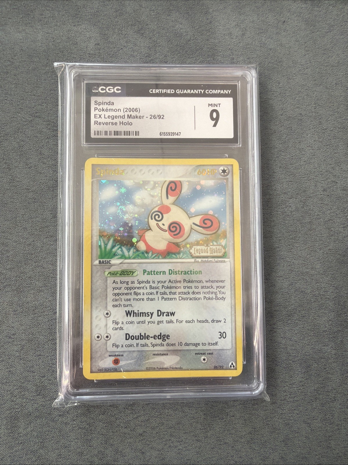 Spinda 26/92 EX Legend Maker Reverse Holo CGC 9 *SWIRL* Spinda 26/92 EX Legend Maker Reverse Holo CGC 9 *SWIRL*