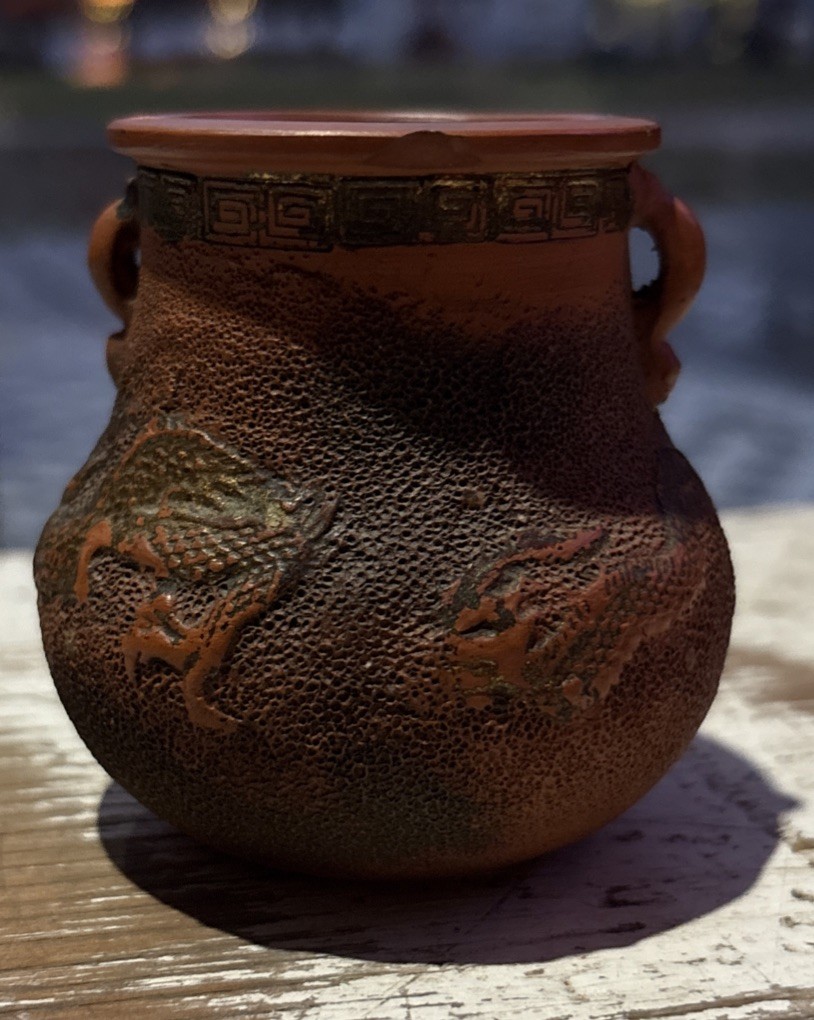 Vintage Tokoname red clay miniature dragon urn vase with gilded accents.