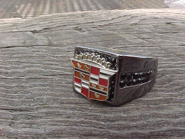 1950s Cadillac Crest Logo Smokey Black Chrome Ring Size #12 NOS Quality Class 1950s Cadillac Crest Logo Smokey Black Chrome Ring Size #12 NOS Quality Class