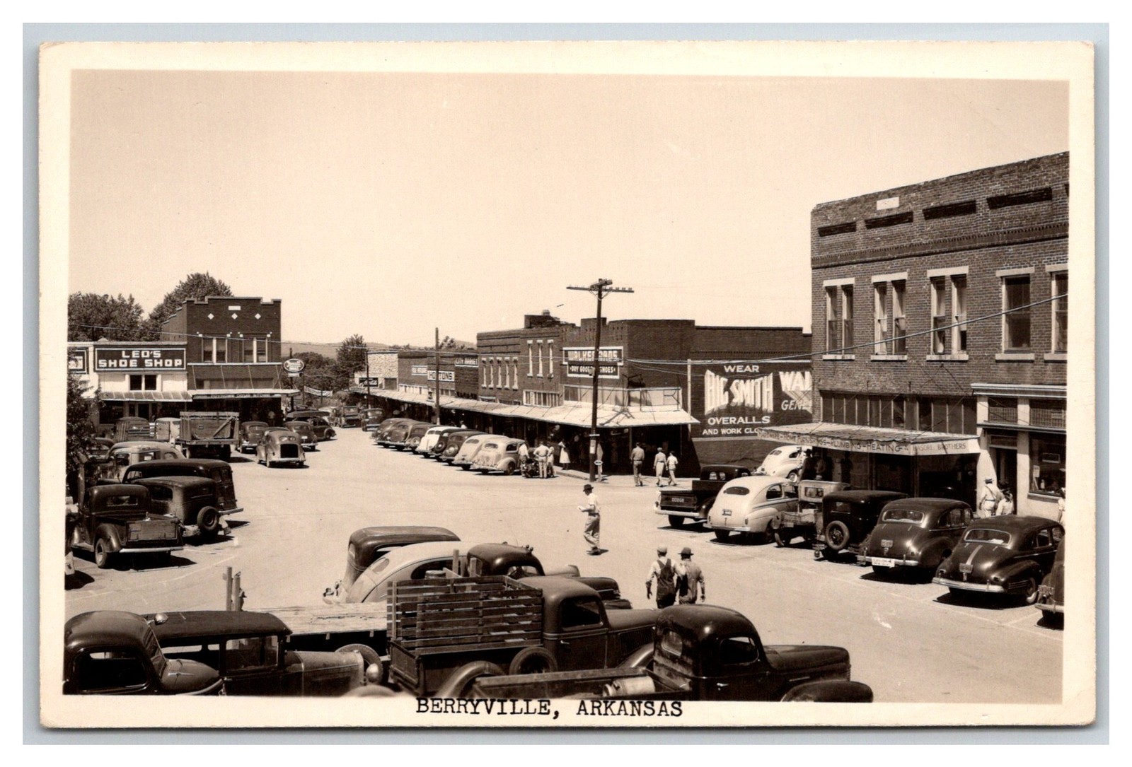 RPPC Berryville AR Main Street view, store fronts, delivery trucks