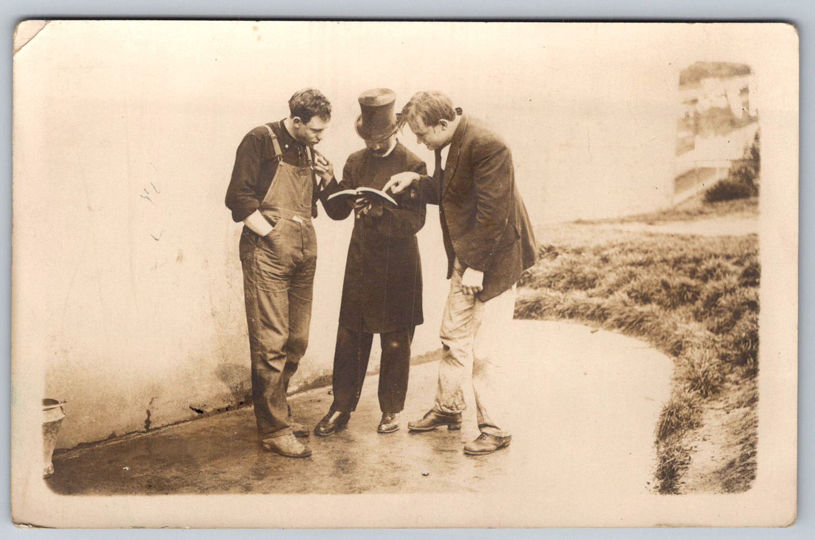 RPPC c1910s Three Men Reading Book Top Hat Workwear Scene Postcard RPPC c1910s Three Men Reading Book Top Hat Workwear Scene Postcard