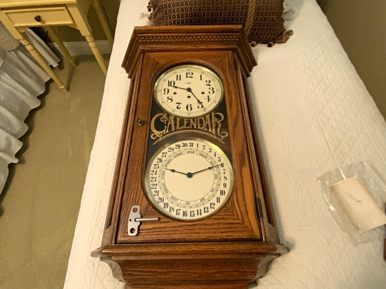 Howard Miller Westminster Mechanical Calendar Wall Clock Brown Wood