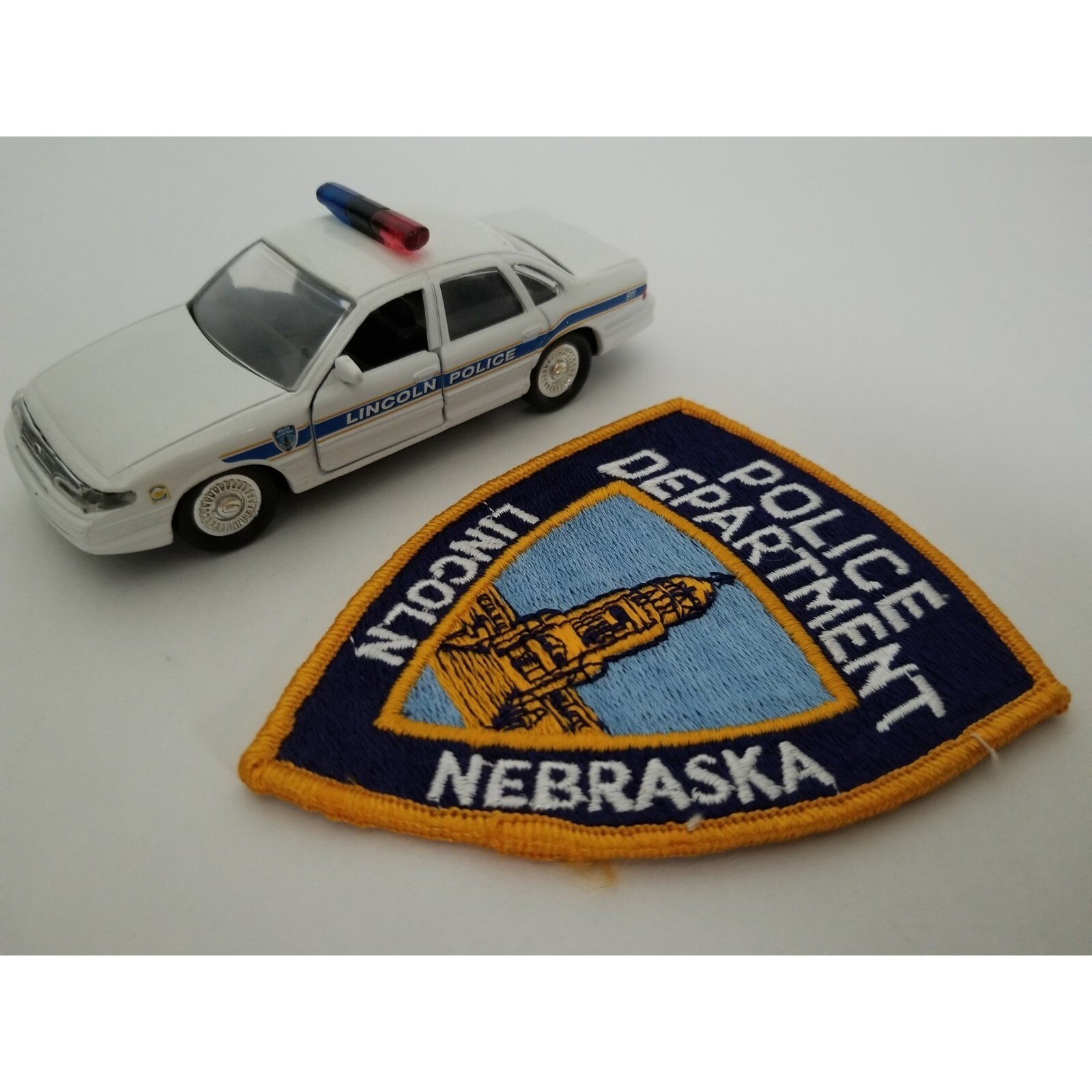 Roadchamps 1:43 Diecast Police Cruiser and Agency Police Patch (Lincoln, NE) Roadchamps 1:43 Diecast Police Cruiser and Agency Police Patch (Lincoln, NE)