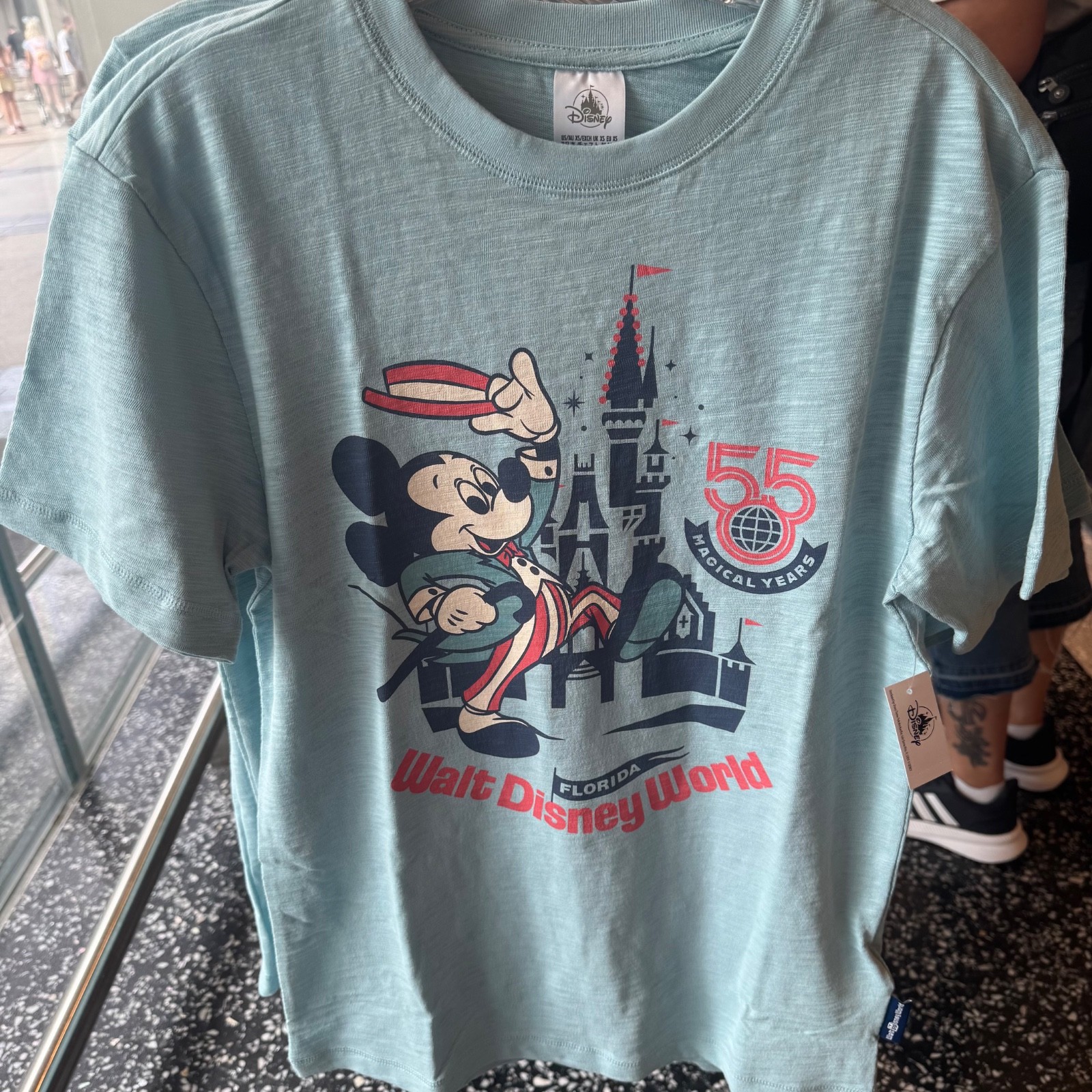 2026 Walt Disney World 55th Anniversary Mickey Castle Blue Shirt Adult Szs NWT 2026 Walt Disney World 55th Anniversary Mickey Castle Blue Shirt Adult Szs NWT