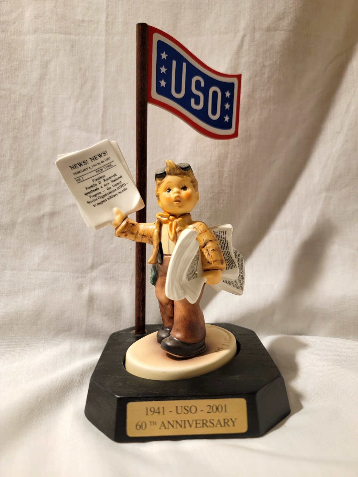 Goebel M.I. Hummel 2113 “Extra Extra”  TMK-8 USO 60th Anniversary with stand