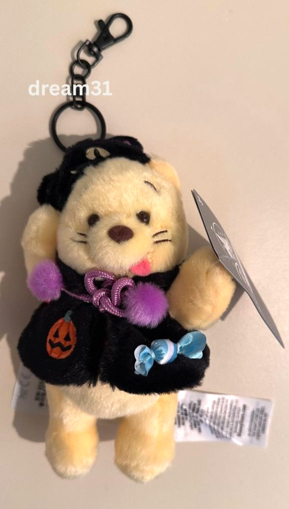 BNWT Disney Parks Winnie the Pooh Halloween in Cat Costume Plush 7 1/2" Keychain BNWT Disney Parks Winnie the Pooh Halloween in Cat Costume Plush 7 1/2" Keychain
