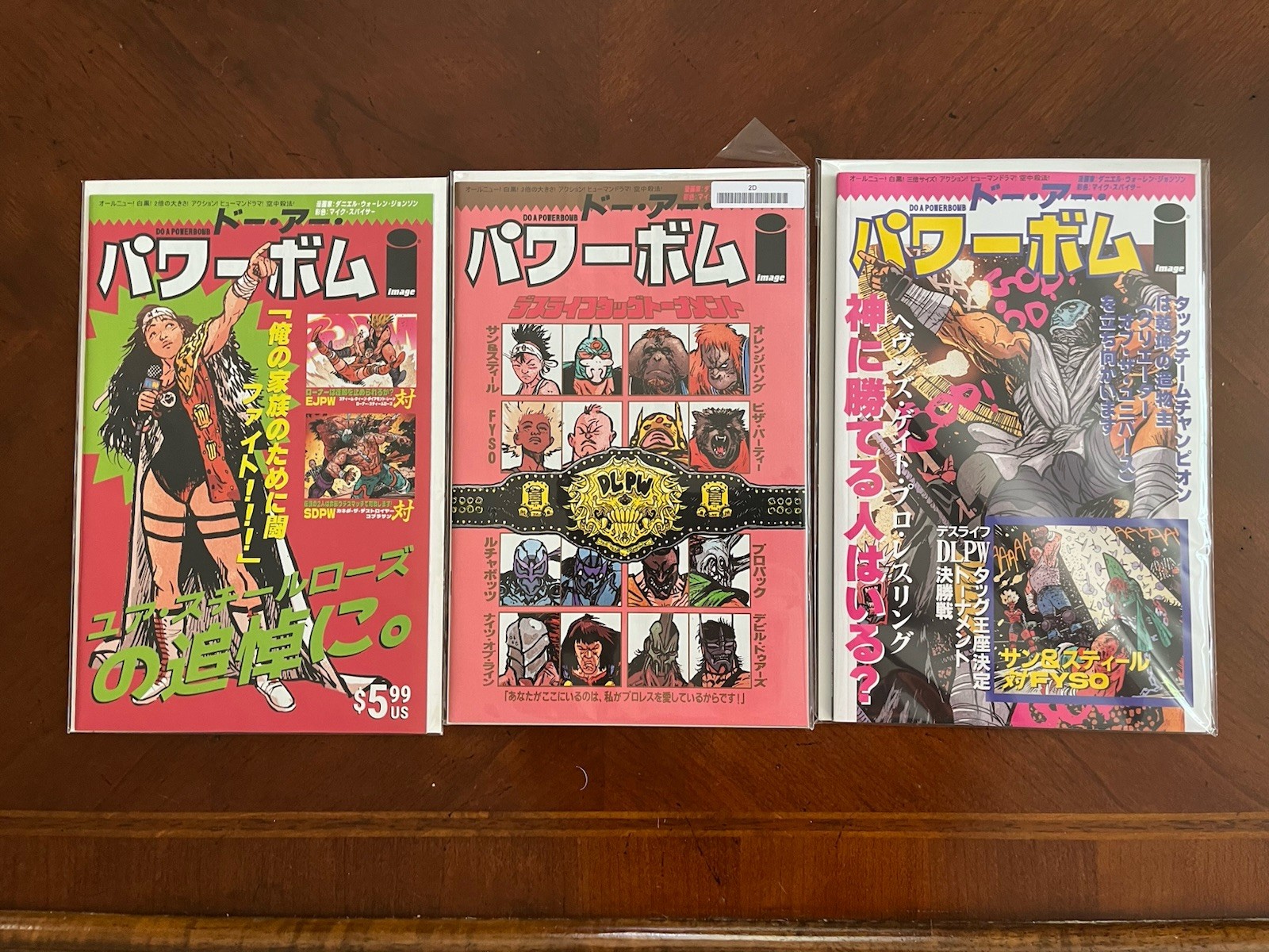 Do a Powerbomb New Japan variants- issues 1-3, Daniel Warren Johnson Bag+Board Do a Powerbomb New Japan variants- issues 1-3, Daniel Warren Johnson Bag+Board