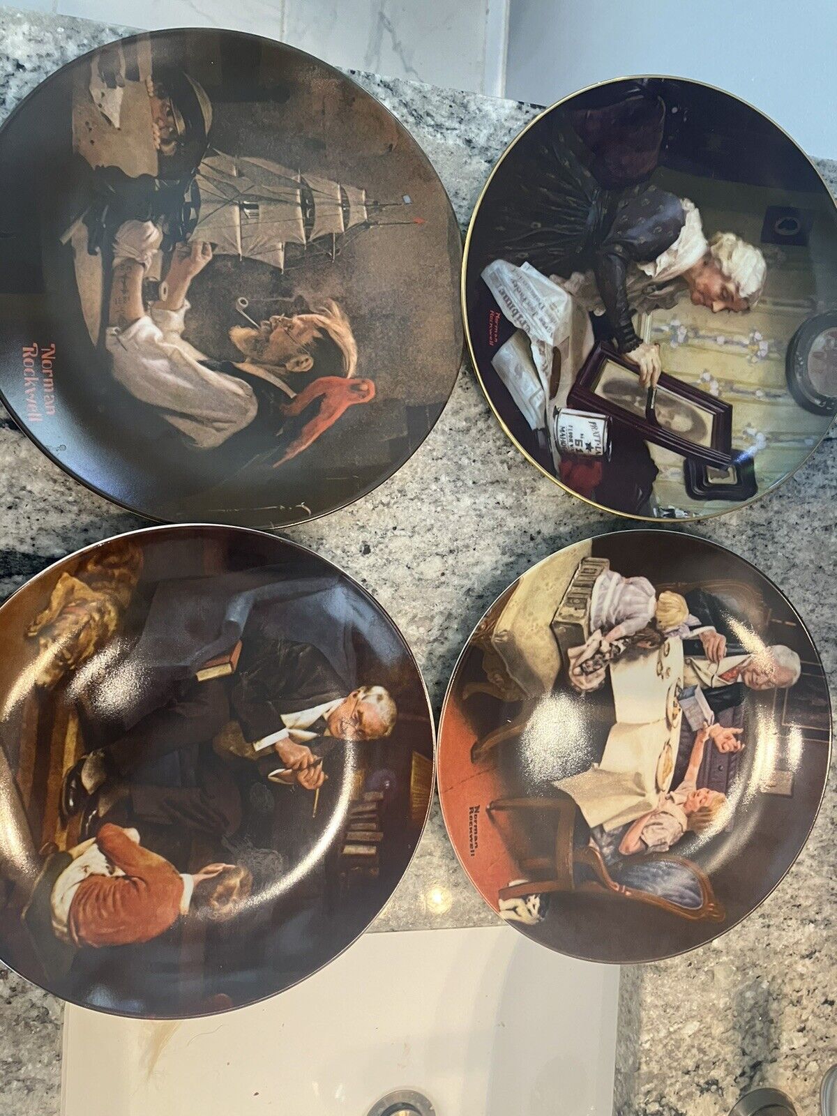 Lot of four Norman Rockwell plates