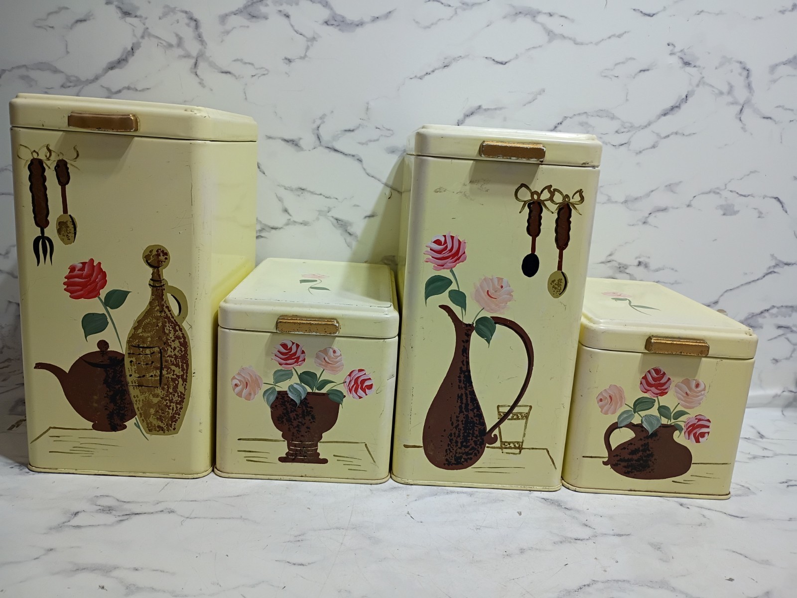 Ransburg Hand-Painted Metal Canister Set Of 4 With Floral Motifs Vtg