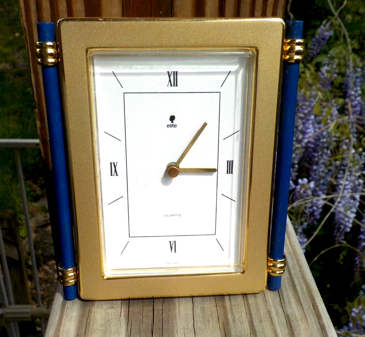 ELITE Desk Quartz Clock, Matte & Shiny Brass White Crystal, Blue Columns England