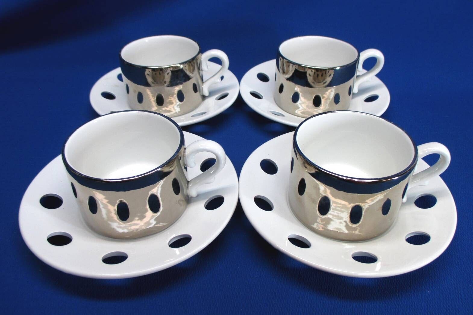 SET OF 4 MOD CHROME ESTE ITALY CUPS & SAUCERS CUPS REFLECT OPEN HOLES IN SAUCER