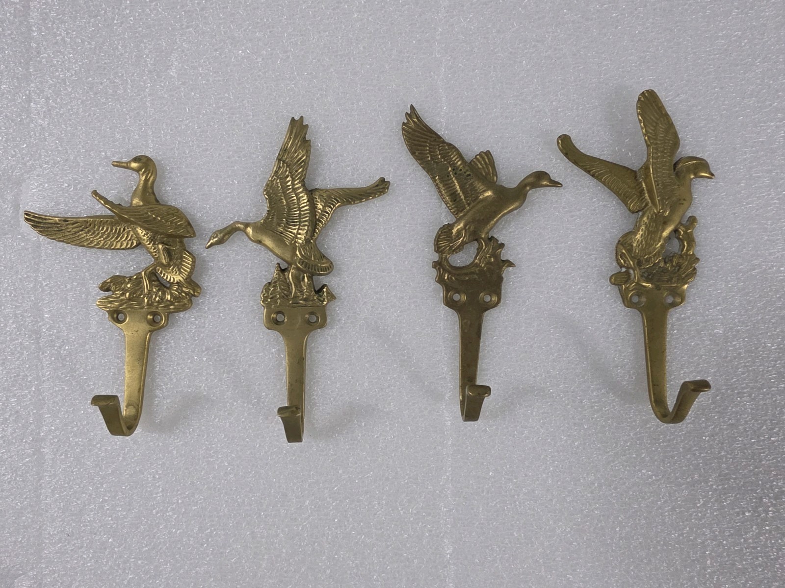 set of four vintage solid brass flying duck wall hooks set of four vintage solid brass flying duck wall hooks