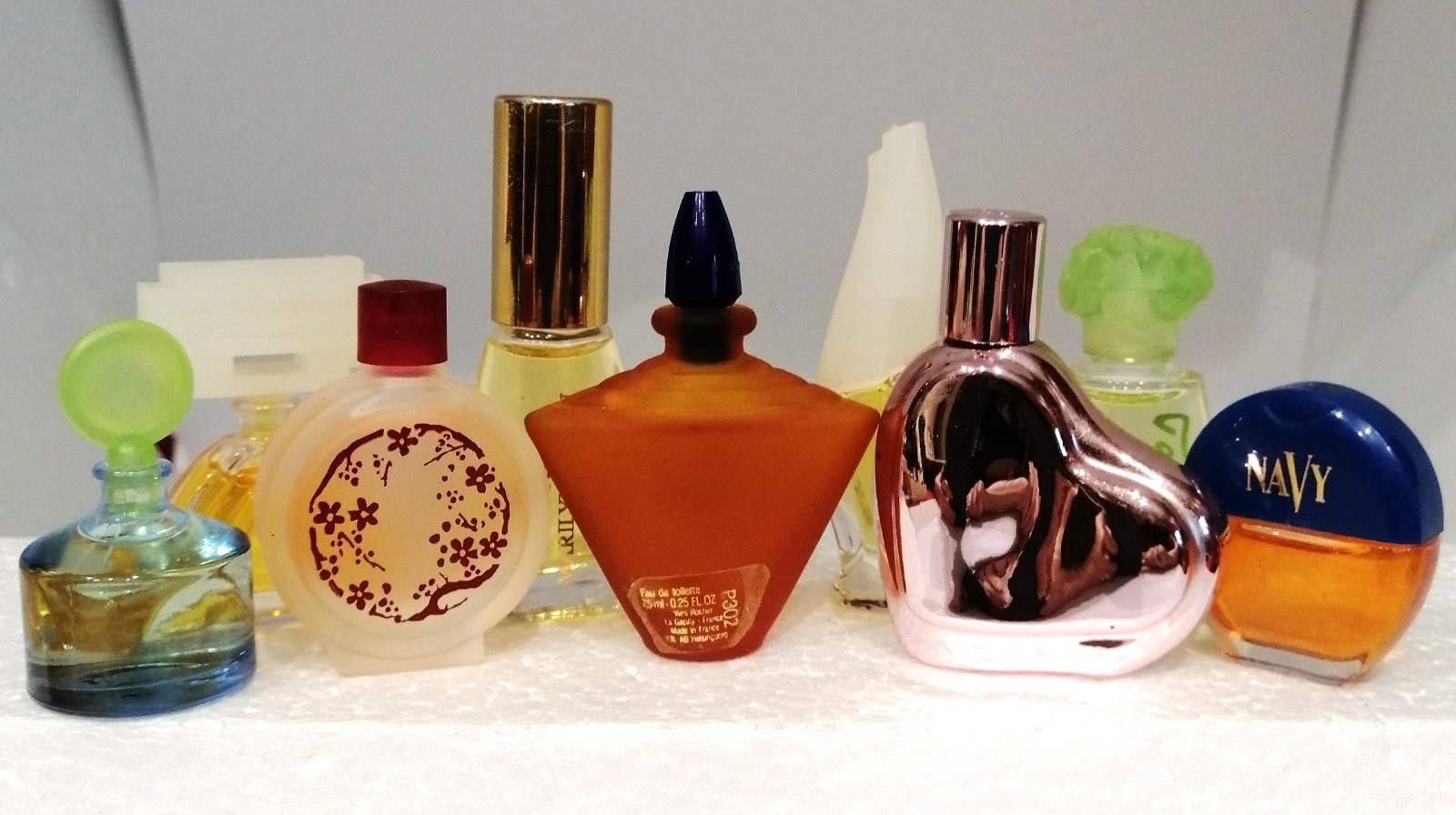 Lot of 9 Mini Bottles Collectible Fragrances by Different Designers. Lot of 9 Mini Bottles Collectible Fragrances by Different Designers.
