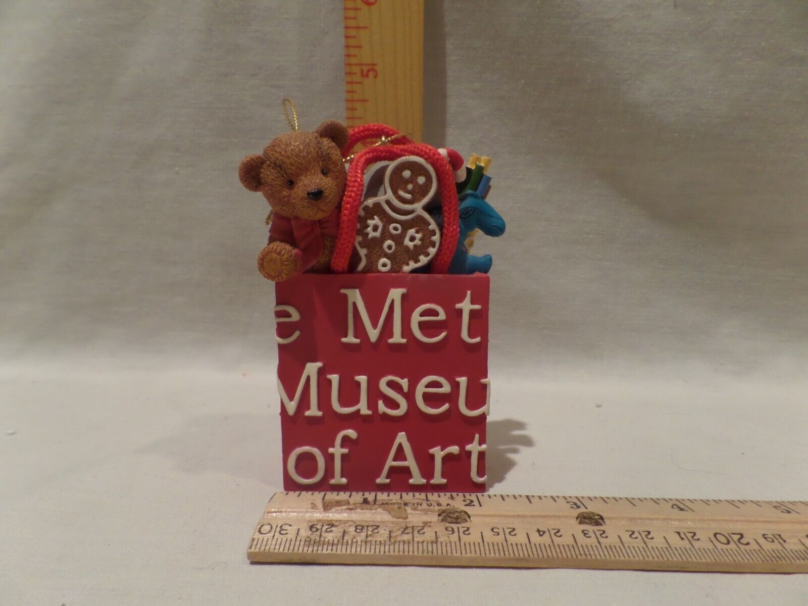 MMA THE METROPOLITAN.MUSEUM OF ART, NEW YORK READ SHOPPING BAG WITH TOYS-ORNAMEN