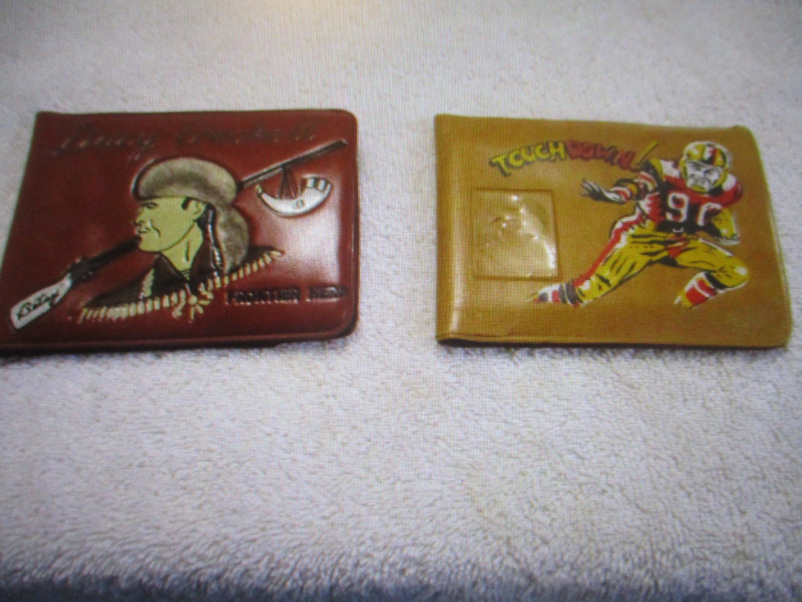 two vintage collectible wallets Davy Crockett and touch down football rare.