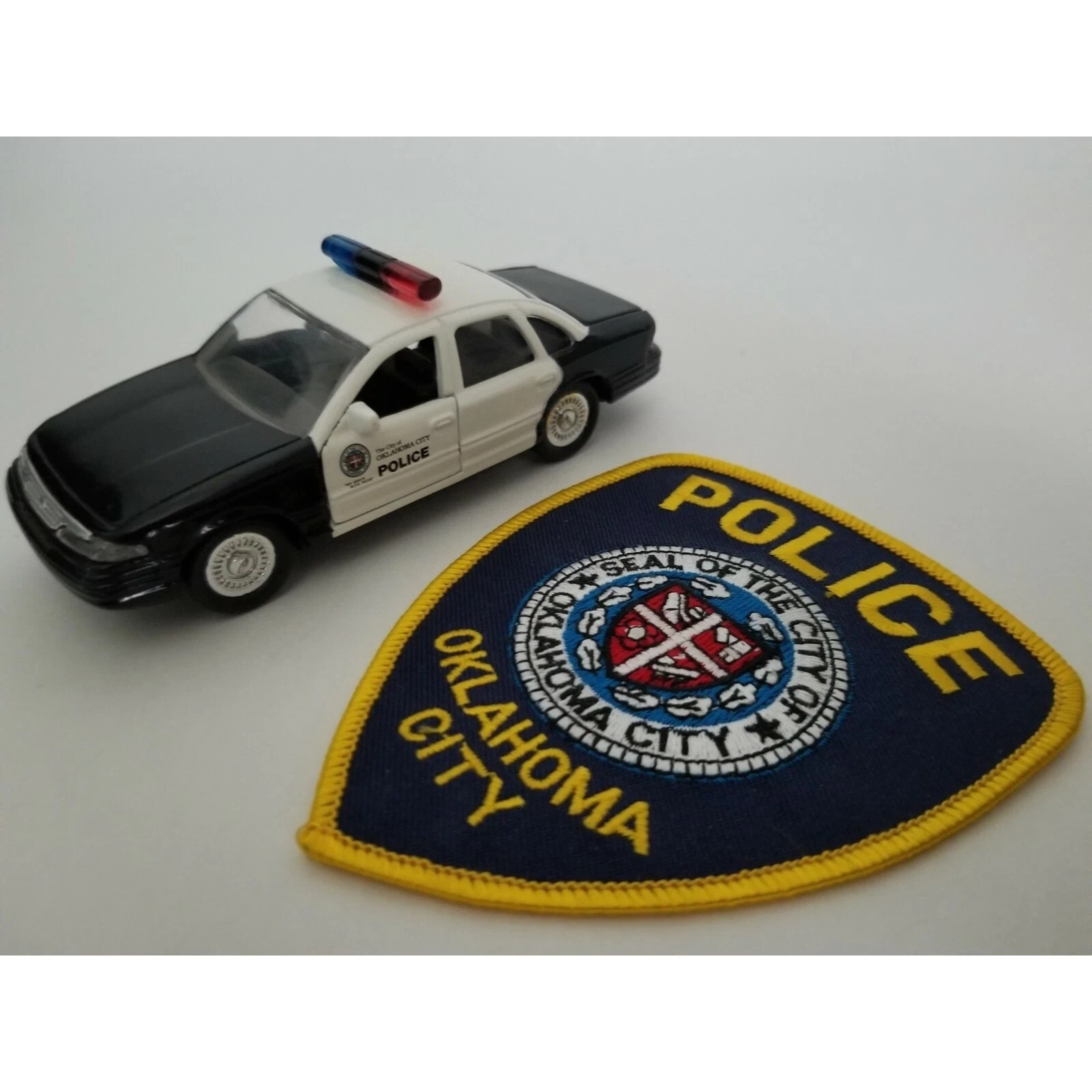 Roadchamps 1:43 Diecast Police Cruiser and Agency Police Patch (Oklahoma City) Roadchamps 1:43 Diecast Police Cruiser and Agency Police Patch (Oklahoma City)