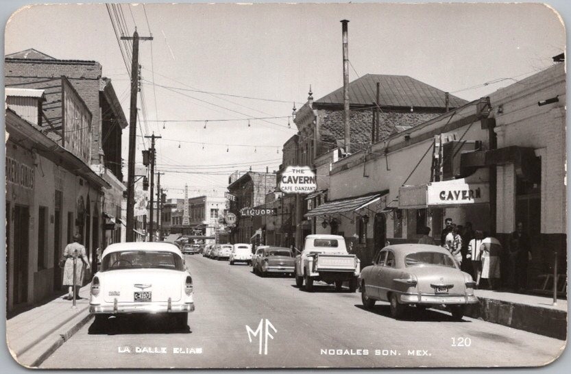 Vintage NOGALES, Sonora MEXICO Real Photo RPPC Postcard "LA CALLE ELIAS" c1960s Vintage NOGALES, Sonora MEXICO Real Photo RPPC Postcard "LA CALLE ELIAS" c1960s