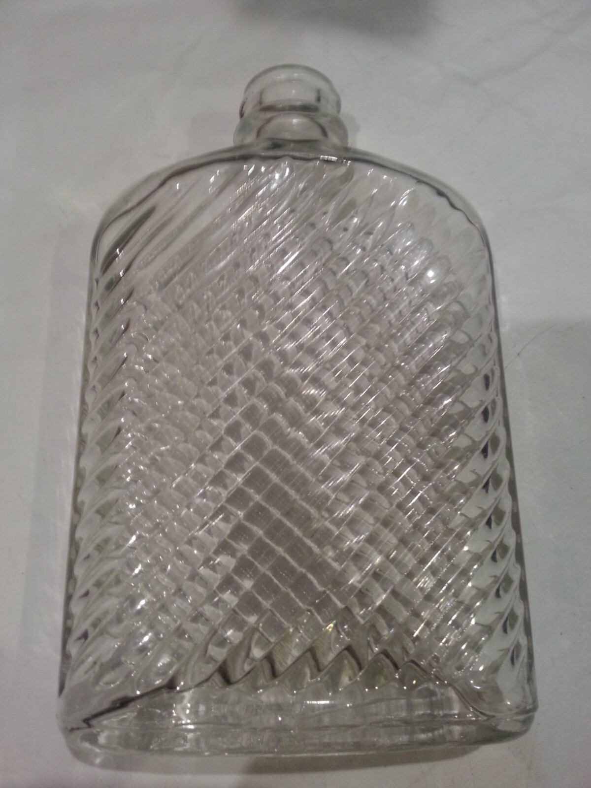 Clear Vintage glass hip flask with diagonal lines pattern Clear Vintage glass hip flask with diagonal lines pattern