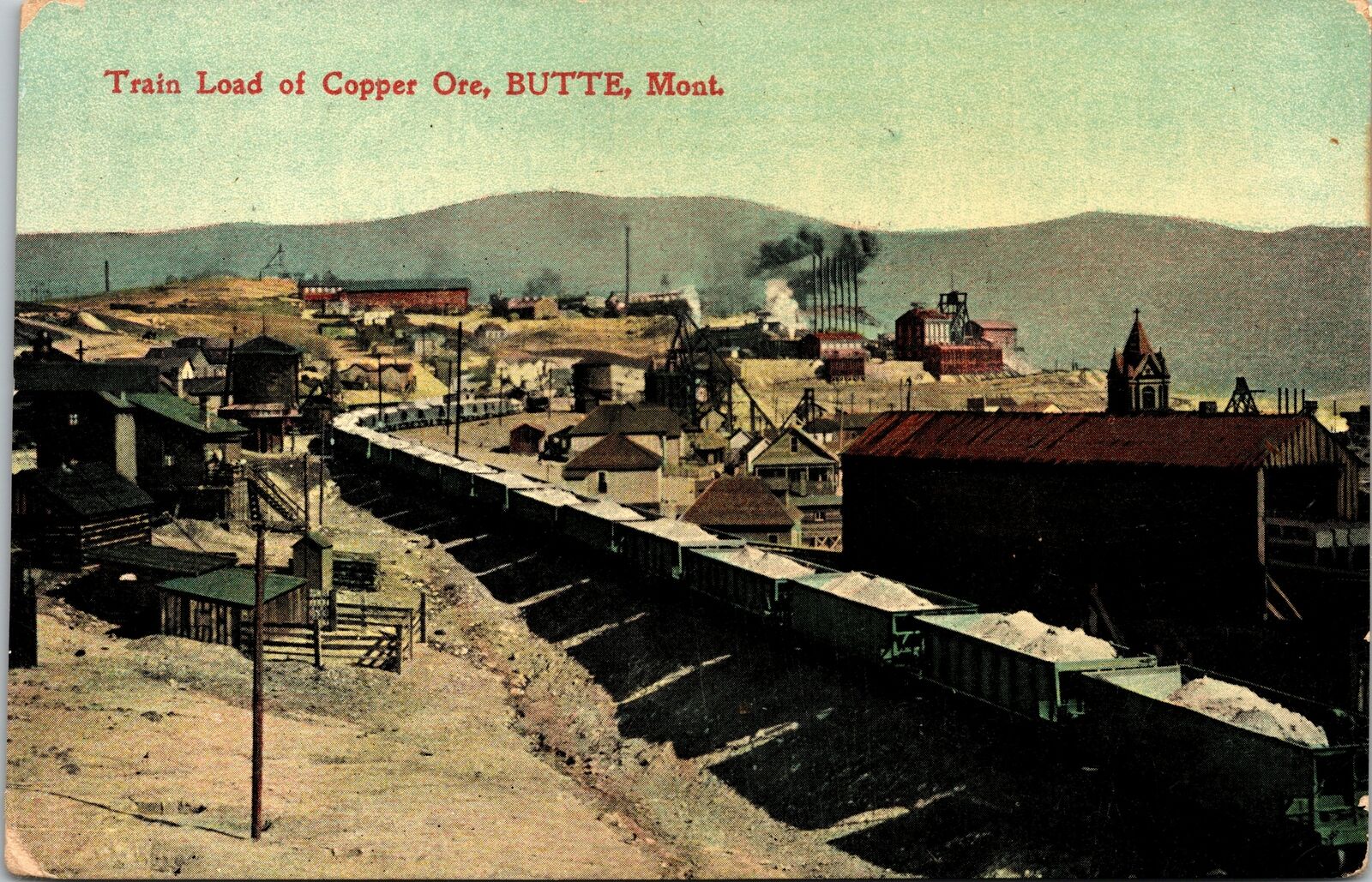 VINTAGE POSTCARD TRAIN LOAD OF COPPER ORE RAIL DEPOT BUTTE MONTANA 1912