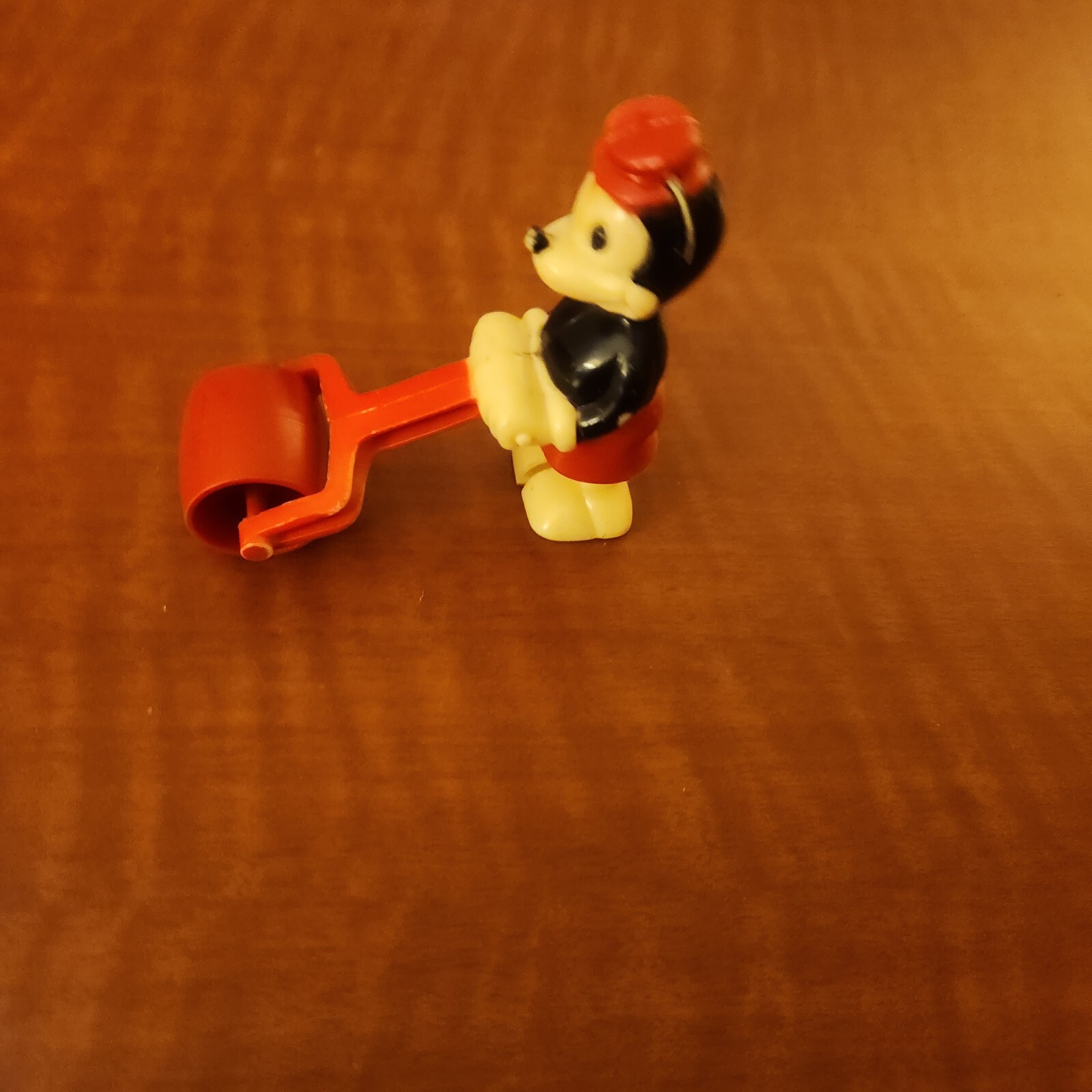 Vintage Mickey Mouse Pushing A Roller