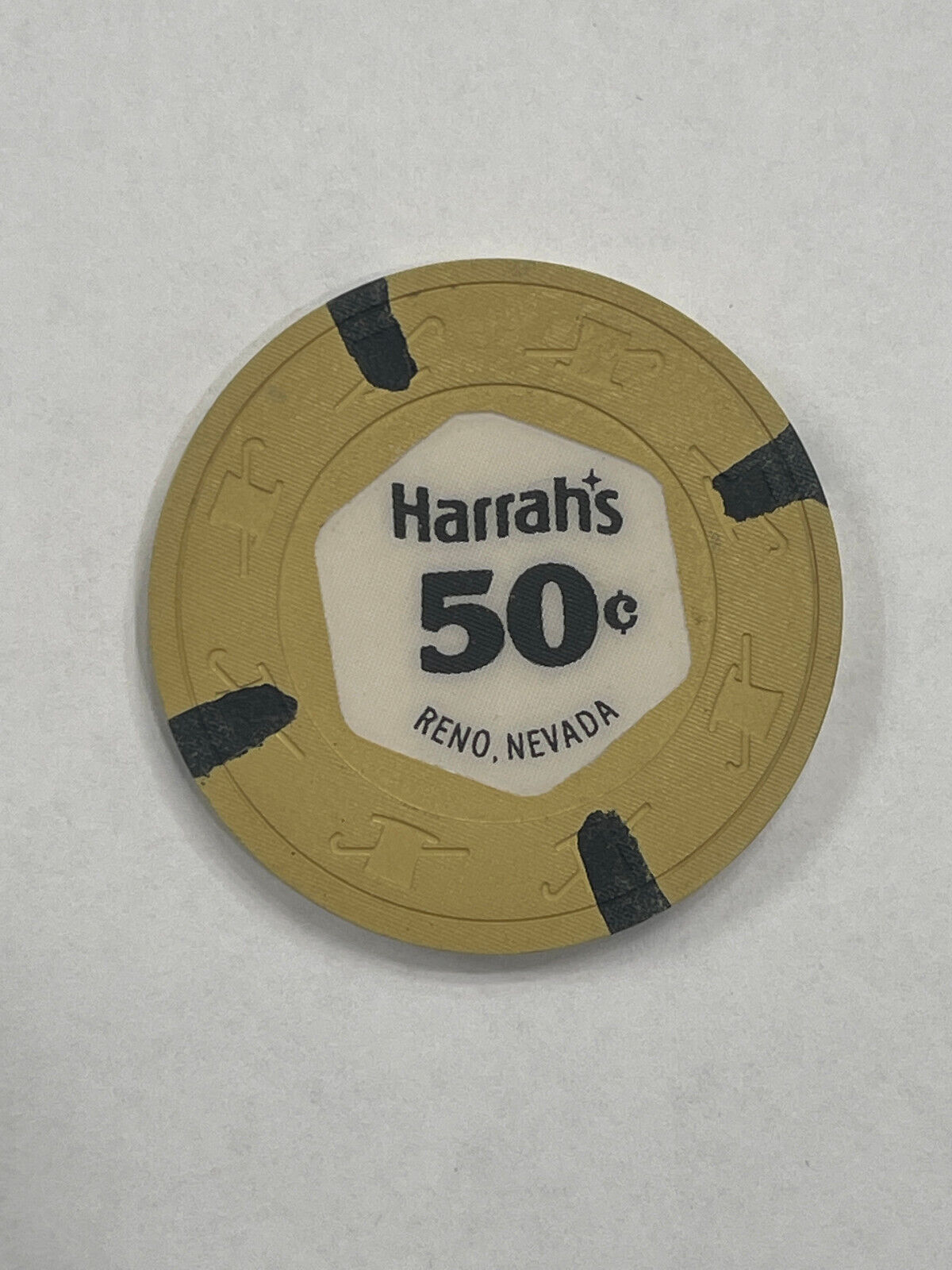 50 CENT HARRAH\'S CASINO CHIP RENO NEVADA 1970\'S VALUE CODE J $50-$59