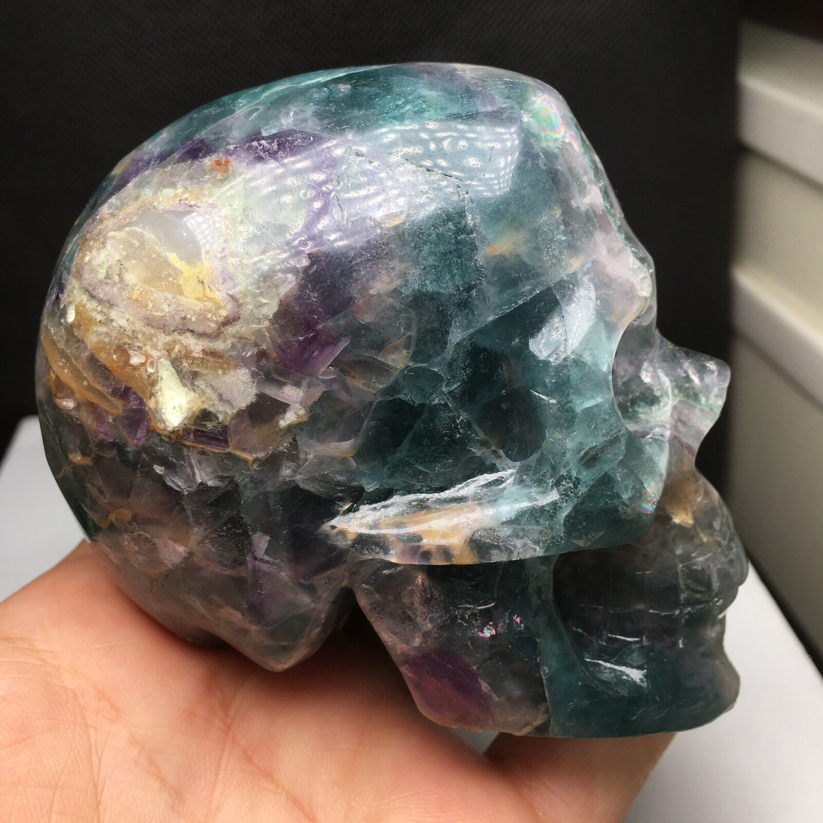 Rare 790g Natural colored striped fluorite. A hand-carved skull. healing