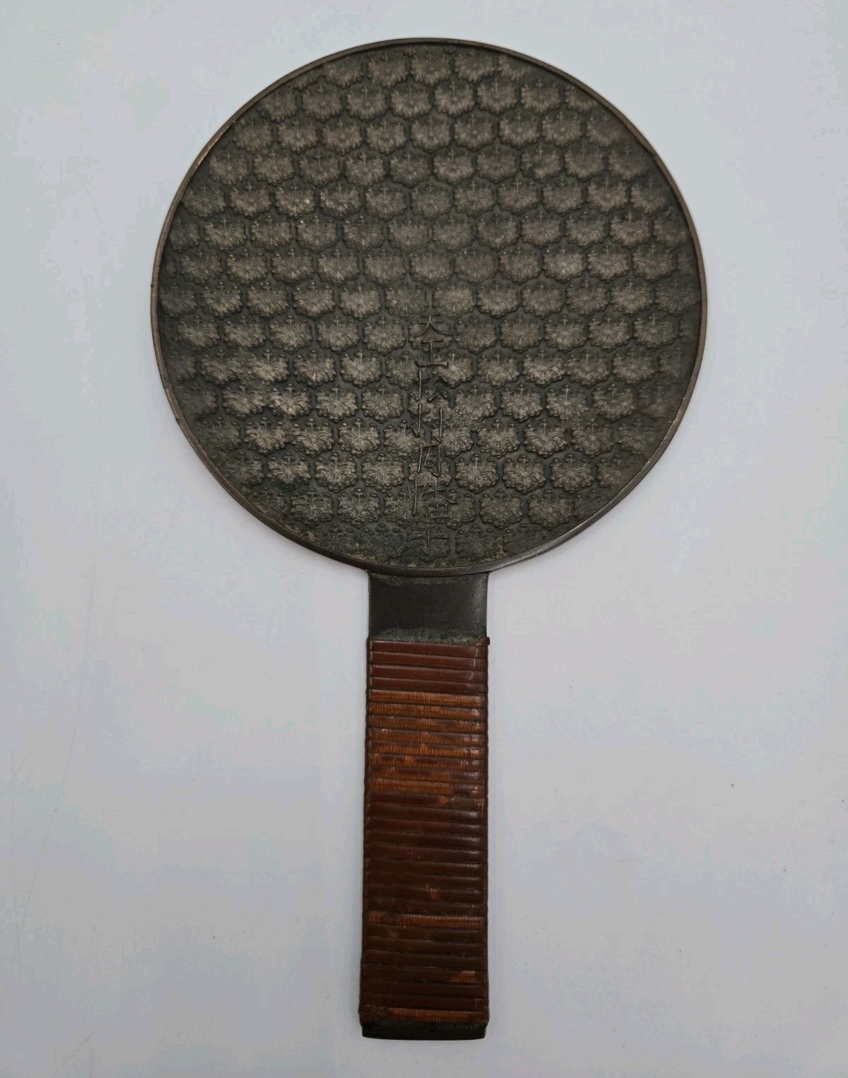 Japanese antique bronze mirror with detailed paulownia pattern, Edo period Japanese antique bronze mirror with detailed paulownia pattern, Edo period