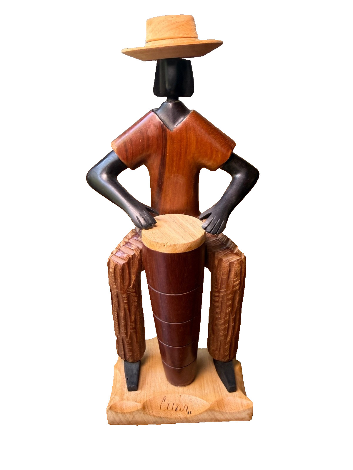 Vintage, Hand-carved Cuban Folk Art Wooden Scultpture of a Conga Drummer. Vintage, Hand-carved Cuban Folk Art Wooden Scultpture of a Conga Drummer.