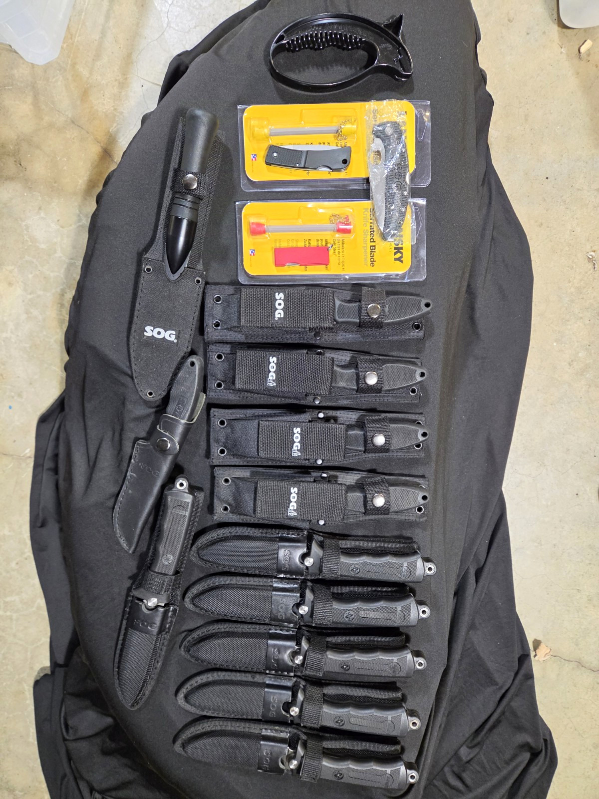 SOG Mixed Knife Lot Fixed Blades, Folding, Lansky Sharpener Great Bundle Deal. SOG Mixed Knife Lot Fixed Blades, Folding, Lansky Sharpener Great Bundle Deal.