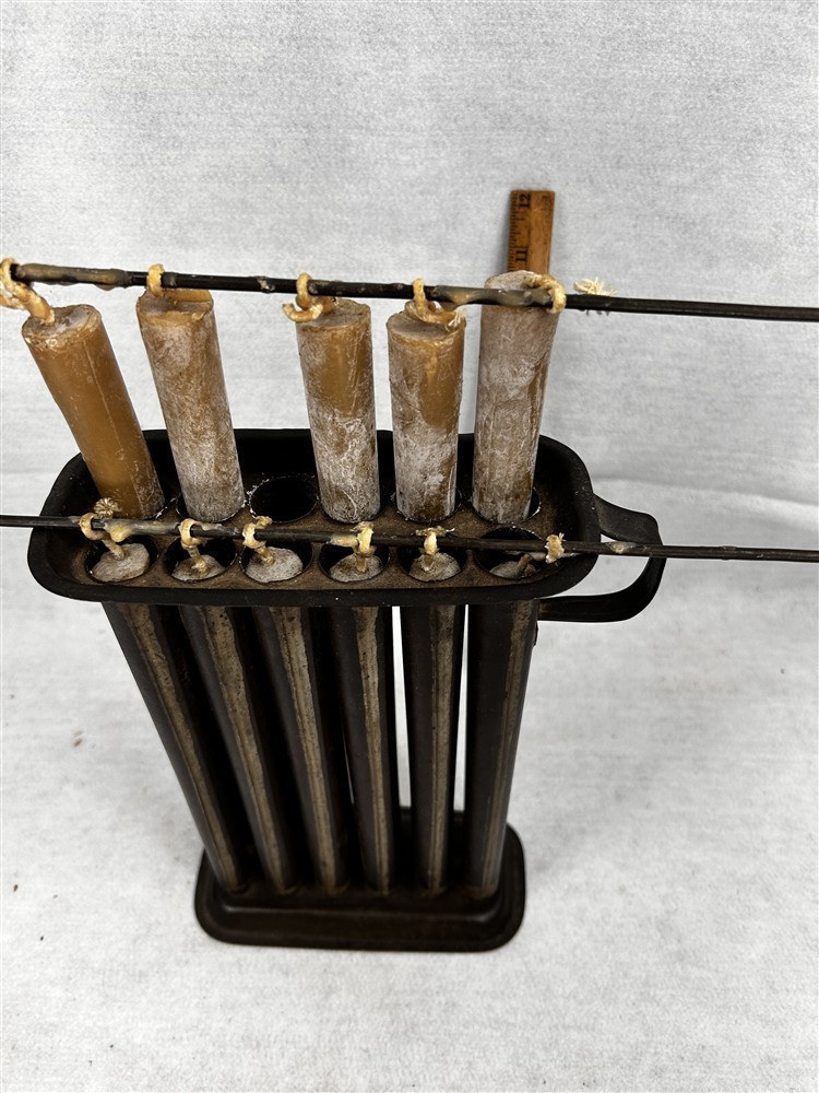 antique tin candle mold strung w/ candles 12 stems early primitive 19th c antique tin candle mold strung w/ candles 12 stems early primitive 19th c