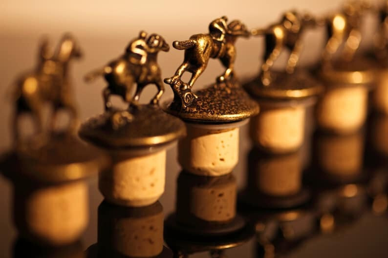 Blanton's Bourbon Complete Set of 8 Bottle Stoppers (bronze color) Blanton's Bourbon Complete Set of 8 Bottle Stoppers (bronze color)