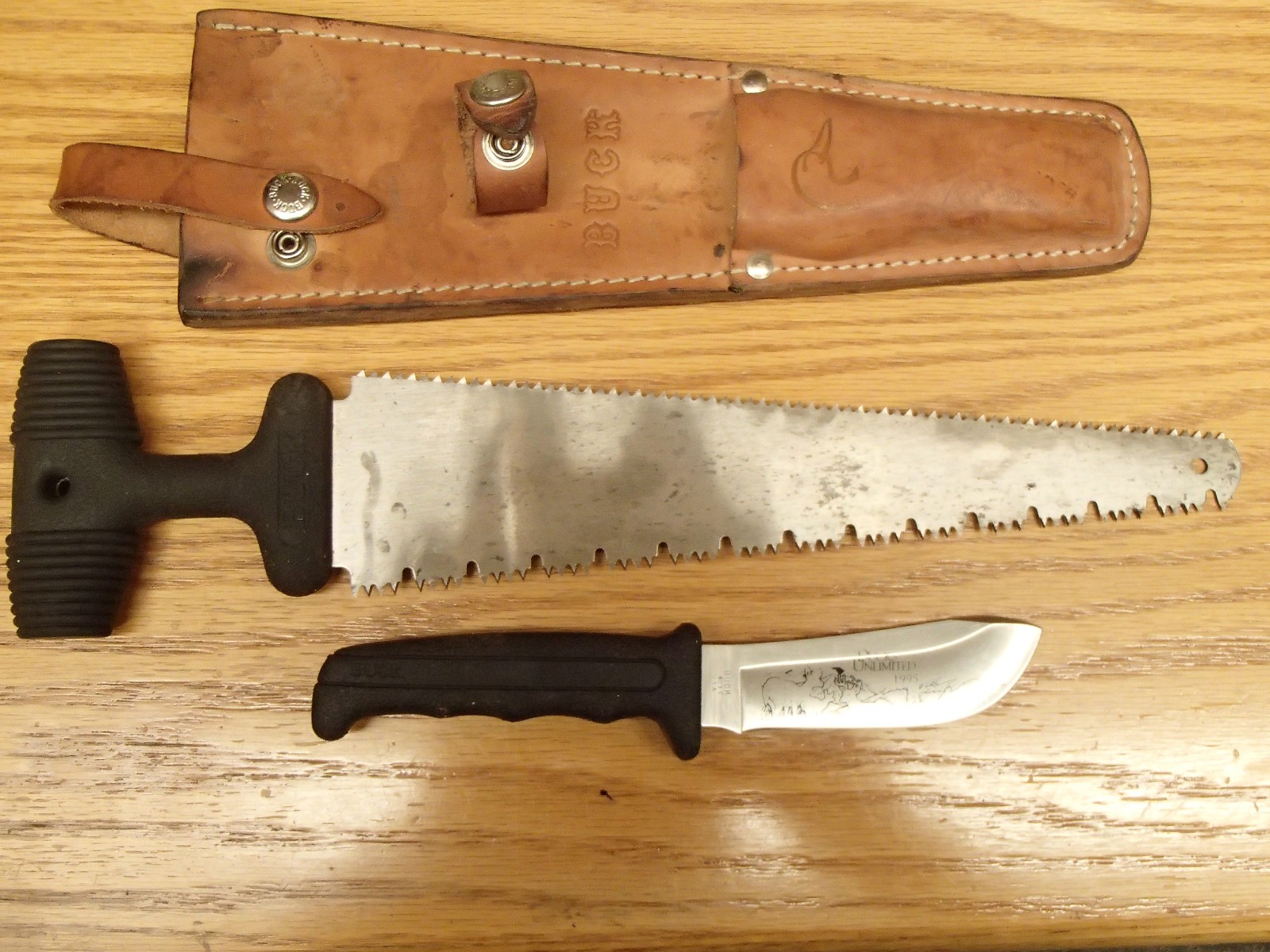 Ducks Unlimited Buck USA 603C Knife & Sawblade Combo with Buck Leather Sheath. Ducks Unlimited Buck USA 603C Knife & Sawblade Combo with Buck Leather Sheath.
