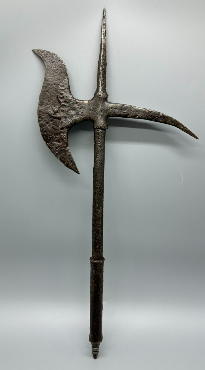 Ancient European war poleaxe approximately 14th-16th century AD Ancient European war poleaxe approximately 14th-16th century AD