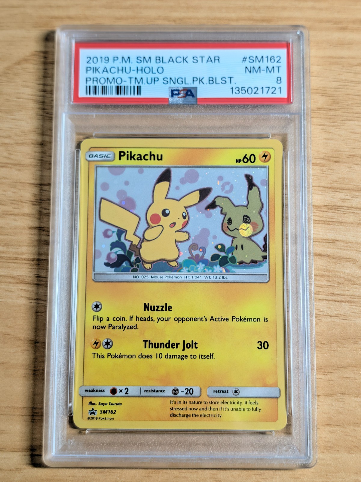 PSA 8 Pikachu Holo Black Star Promo SM162 Pokemon Card PSA 8 Pikachu Holo Black Star Promo SM162 Pokemon Card