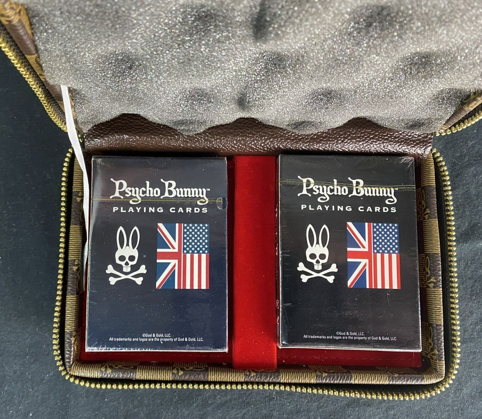 (2) Sealed Psycho Bunny card decks with case. Excellent condition