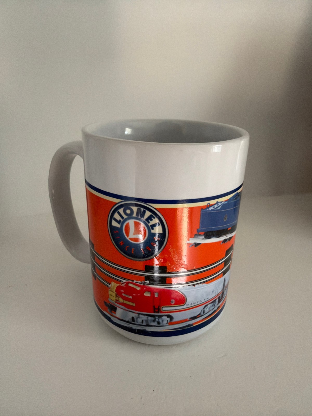 Lionel Trains Coffee Mug 2006 Sherwood Santa Fe F3 Blue Comet Orange Blue 14 oz Lionel Trains Coffee Mug 2006 Sherwood Santa Fe F3 Blue Comet Orange Blue 14 oz