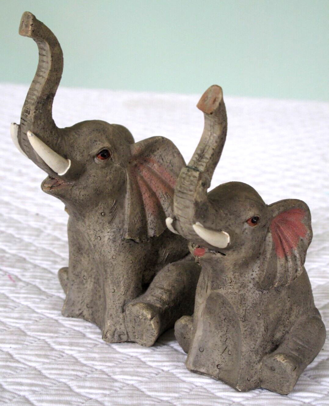 2 Vintage Sitting Elephants Trunks Up Tusks Glass Eyes Resin Figurines 5” & 6" 2 Vintage Sitting Elephants Trunks Up Tusks Glass Eyes Resin Figurines 5” & 6"