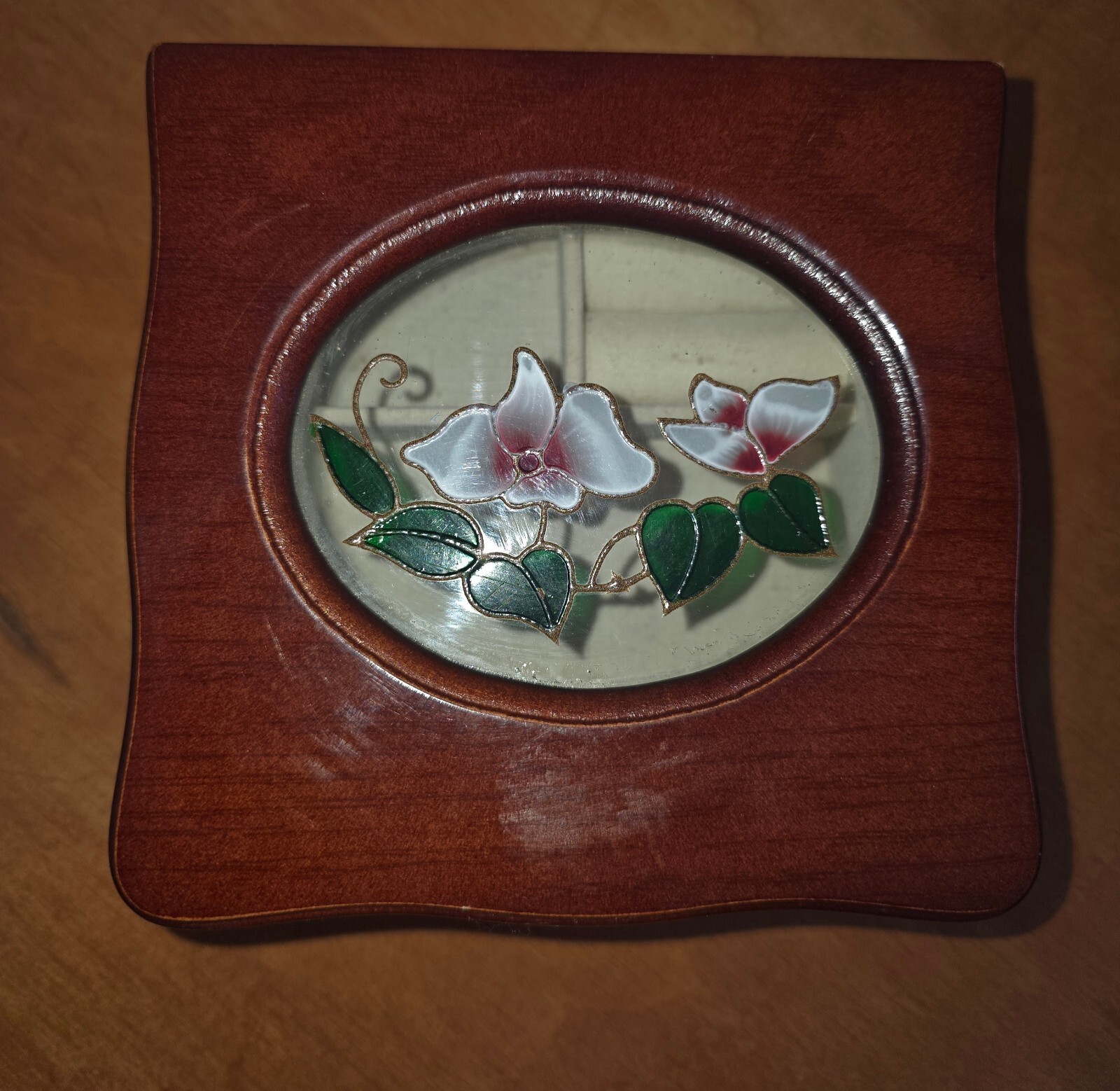 Vintage wooden jewelry or trinket box with floral painting