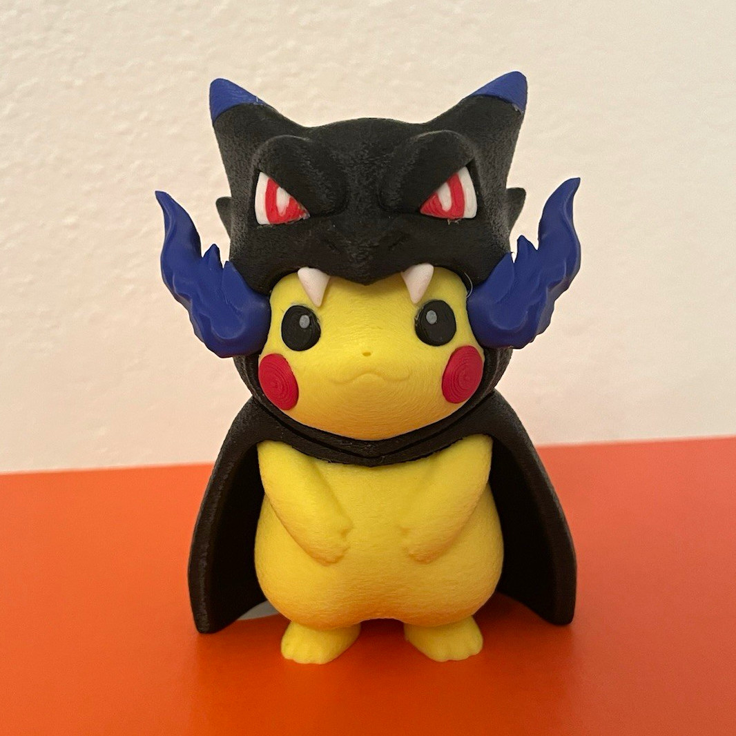 Pokémon Pikachu Mega Charzard x poncho 3d printed Pokémon Pikachu Mega Charzard x poncho 3d printed