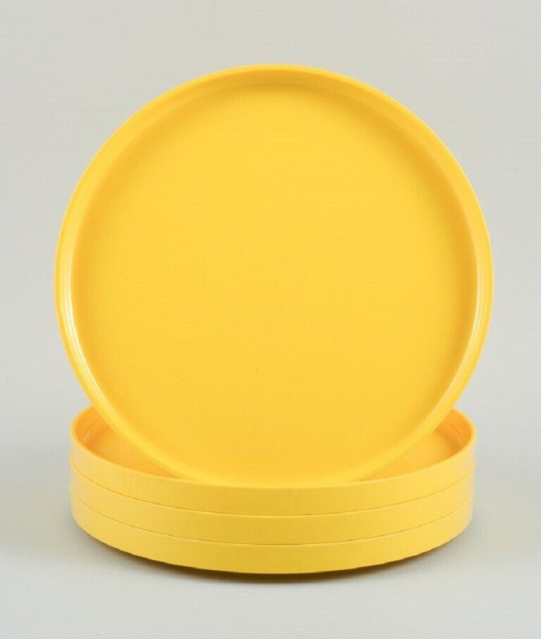 Massimo Vignelli for Heller, Italy. A set of 4 dinner plates in yellow melamine