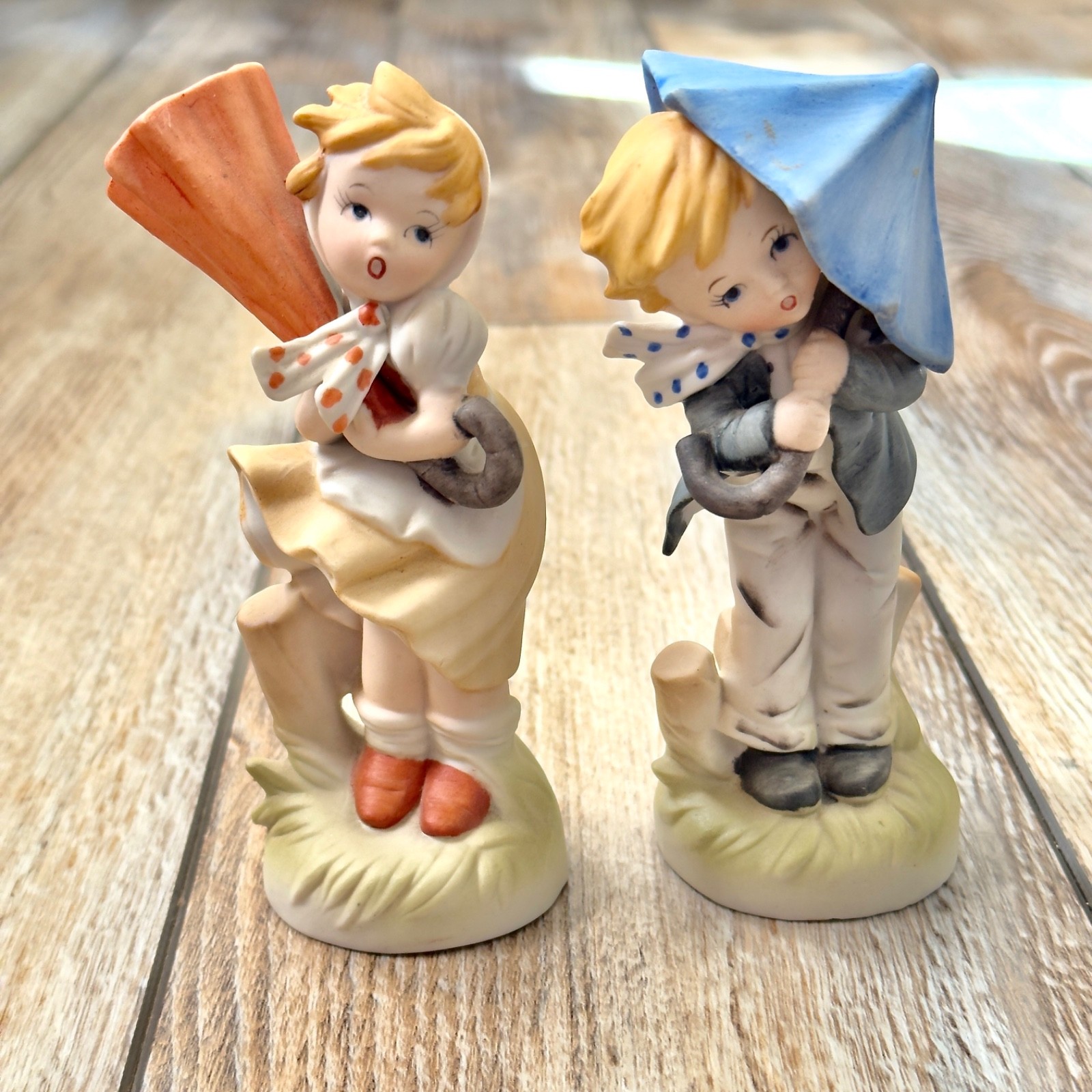 Vintage Windy Rainy Day Umbrella Boy And Girl Figurines Vintage Windy Rainy Day Umbrella Boy And Girl Figurines